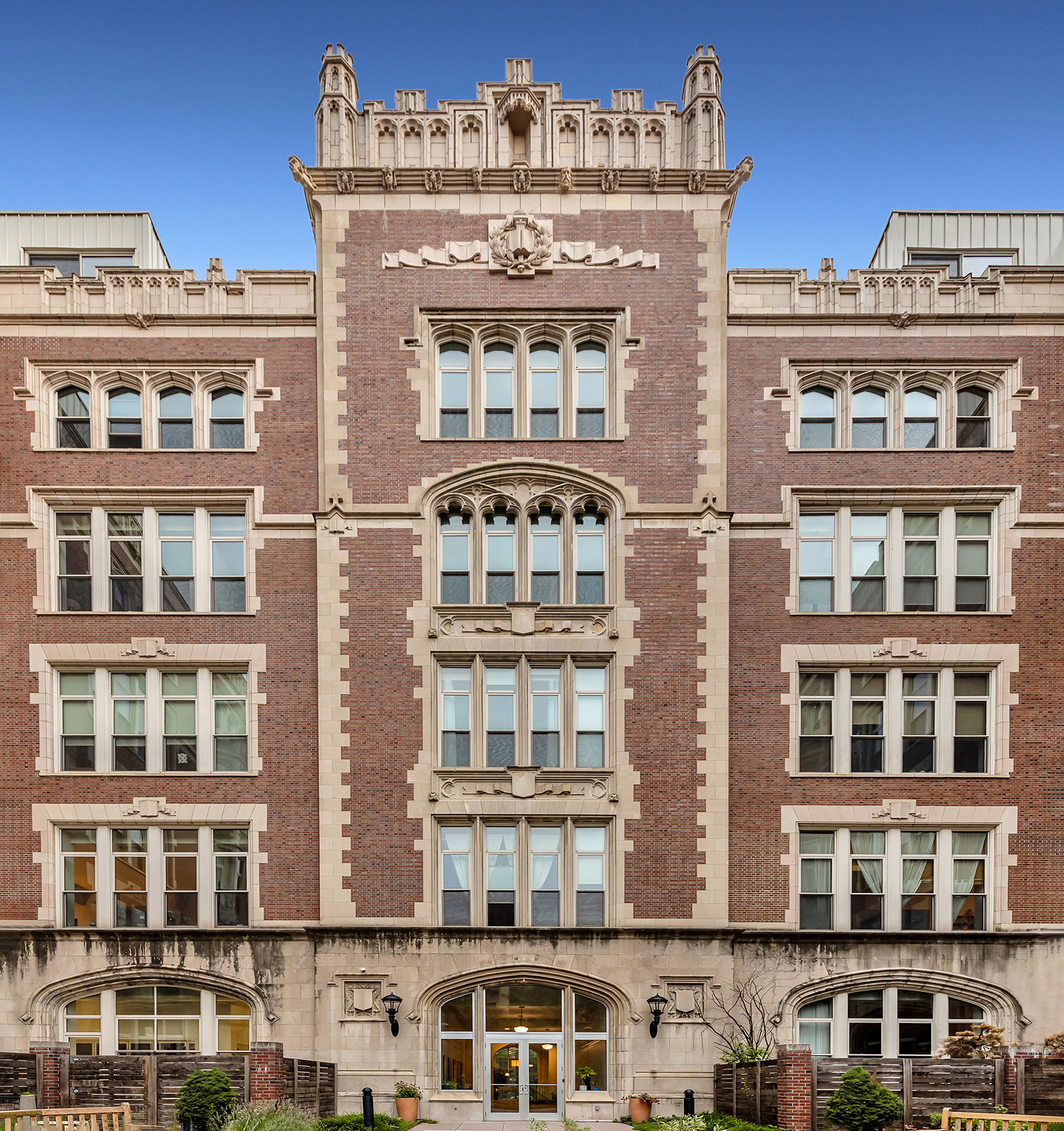 The Gothic Revival facade of the PS90 Condominium at 220 West 148th Street